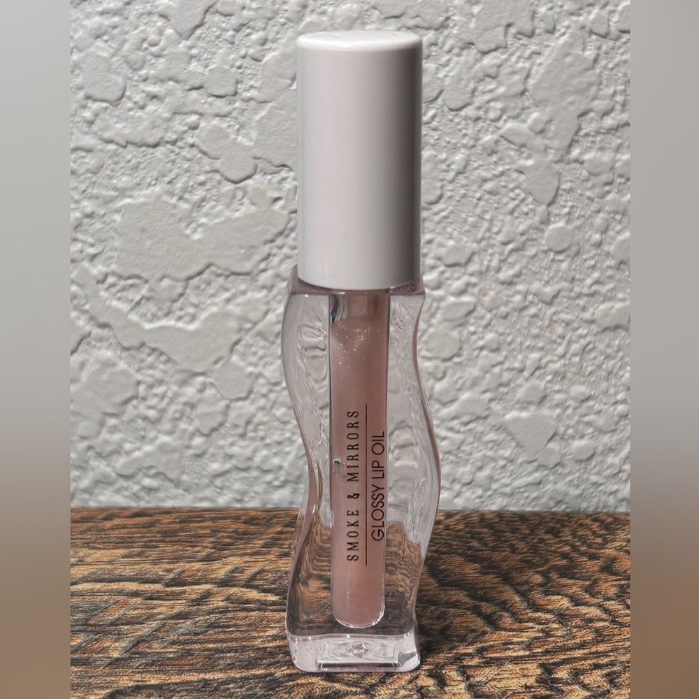 Pink Lip Gloss with Subtle Shine and Nourishing Formula